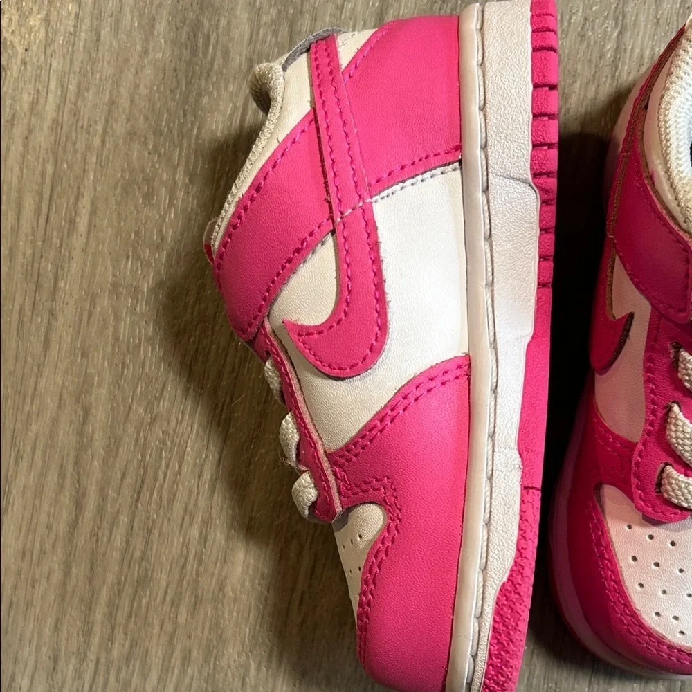 Nike Kids White and Hot Pink Low-Top Sneakers.
